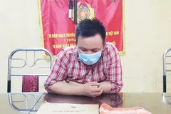 Đối tượng Nguyễn Văn Quý tại cơ quan công an. (Nguồn: Giadinh.net)