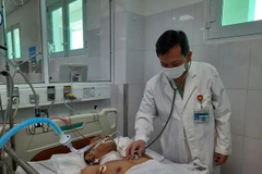 Bệnh nhân Nguyễn V.N. sau khi được phẫu thuật, cứu sống. (Nguồn: Cand.com.vn)
