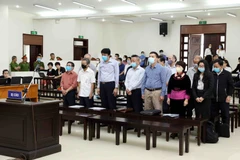 Các bị cáo tại phiên tòa. (Ảnh: Phạm Kiên/TTXVN)