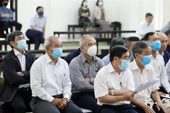 Các bị cáo tại phiên tòa. (Ảnh: Phạm Kiên/TTXVN)