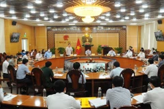 Quang cảnh hội nghị trực tuyến về tình hình dịch, bệnh COVID-19 trên địa bàn tỉnh Long An. (Ảnh: Đức Hạnh/TTXVN)