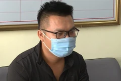 Đối tượng Nghiêm Đình Chỉnh tại cơ quan Cảnh sát điều tra. (Ảnh: TTXVN phát)