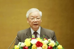 Chủ tịch nước Nguyễn Phú Trọng trình Quốc hội miễn nhiệm chức vụ Thủ tướng Chính phủ đối với ông Nguyễn Xuân Phúc. (Ảnh: Trí Dũng/TTXVN)