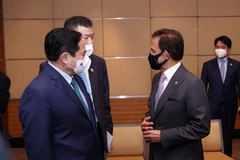 Thủ tướng Phạm Minh Chính chào xã giao Quốc vương Brunei Haji Hassanal Bolkiah, Chủ tịch ASEAN 2021. (Ảnh: Dương Giang/TTXVN)