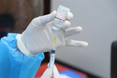 Tiêm vaccine phòng COVID-19. (Nguồn: TTXVN)