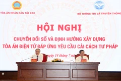 Ông Nguyễn Hòa Bình - Ủy viên Bộ Chính trị, Bí thư Trung ương Đảng, Chánh án Tòa án Nhân dân Tối cao và ông Nguyễn Mạnh Hùng - Ủy viên Ban Chấp hành Trung ương Đảng, Bộ trưởng Bộ Thông tin và Truyền thông đồng chủ trì Hội nghị. (Nguồn: Congly.vn)