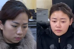 Nguyễn Thị Ngọc Huyền và Trần Mỹ Linh tại cơ quan công an. (Nguồn: Báo Lao động)