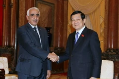 Chủ tịch nước Trương Tấn Sang tiếp ông Slimane Boudi, Chánh án thứ nhất Tòa án tối cao A​lgieria, sang thăm và làm việc tại Việt Nam. (Ảnh: Nguyễn Khang/TTXVN)