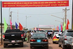 Quang cảnh cửa khẩu Chàng Riệc trong ngày lễ công bố. (Ảnh: Lê Đức Hoảnh/TTXVN)