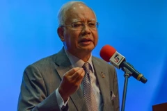 Thủ tướng Malaysia Najib Razak phát biểu trong cuộc họp báo về dự thảo ngân sách tại Kuala Lumpur ngày 28/1. (Nguồn: AFP/TTXVN)