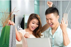 Vietcombank ưu đãi 0% cho các chủ thẻ khi mua sắm. (Ảnh: CTV/Vietnam+)