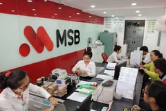 Giao dịch tại ngân hàng. (Nguồn: CTV)