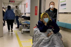 COVID-19: Trung Quốc cấp phép sử dụng có điều kiện thuốc Molnupiravir