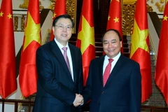 Thủ tướng Nguyễn Xuân Phúc tiếp Ủy viên trưởng Trương Đức Giang. (Ảnh: Thống Nhất/TTXVN)