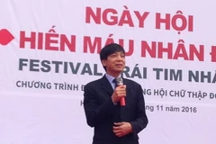 Phó Chủ tịch, Tổng Thư ký Trung ương Hội Chữ thập Đỏ Việt Nam Đoàn Văn Thái phát biểu tại ngày hội hiến máu. (Ảnh: Mỹ Bình/Vietnam+)