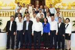Thủ tướng Nguyễn Xuân Phúc với các đại biểu. (Ảnh: Thống Nhất/TTXVN)
