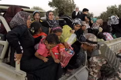 Người tị nạn Syria tới khu vực Ramtha sau khi qua biên giới Syria - Jordan ngày 5/9/2012. (Ảnh: AFP/ TTXVN)