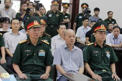Bị cáo Đinh Ngọc Hệ, nguyên Phó Tổng giám đốc Tổng Công ty Thái Sơn (Bộ Quốc phòng) tại phòng xét xử. (Ảnh: Văn Điệp/TTXVN)