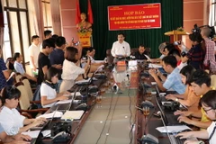 Ông Mai Văn Trinh, Cục trưởng Cục Quản lý chất lượng, Bộ GD và ĐT thông tin cho báo chí tại buổi họp báo công bố kết quả điều tra nghi vấn gian lận chấm thi THPT quốc gia tại Hà Giang. (Ảnh: Minh Tâm/TTXVN)