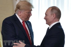 Tổng thống Mỹ Donald Trump và Tổng thống Nga Vladimir Putin tại cuộc gặp ở Helsinki, Phần Lan ngày 16/7. (Nguồn: AFP/TTXVN)