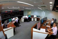 Ca trực vận hành hệ thống điện toàn quốc tại Trung tâm Điều độ Hệ thống điện Quốc gia. (Ảnh: Ngọc Hà/TTXVN)