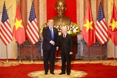 Tổng Bí thư, Chủ tịch nước Nguyễn Phú Trọng tiếp Tổng thống Hoa Kỳ Donald Trump. (Ảnh: Trí Dũng/TTXVN)