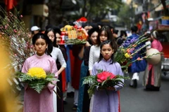 Đoàn rước lễ sẽ mặc trang phục truyền thống để tôn vinh những giá trị cổ truyền. (Ảnh: PV/Vietnam+)