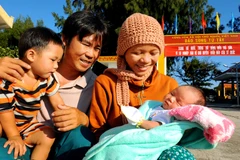 Gia đình hạnh phúc. (Ảnh minh họa: Nguyễn Á/Vietnam+)