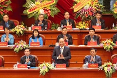 Thủ tướng Nguyễn Xuân Phúc đối thoại với đại biểu tham gia Đại hội Công đoàn Việt Nam lần thứ XII. (Ảnh: TTXVN)