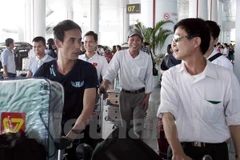 Lao động Việt Nam đi làm việc ở nước ngoài trở về. (Ảnh minh họa: Vietnam+)