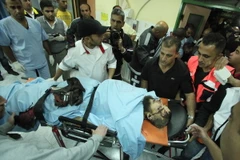 Thi thể tay súng Palestin bị binh sỹ Israel bắt chết sau vụ đấu súng ngày 27/11. (Nguồn: THX/TTXVN)