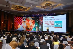 Quang cảnh lễ công bố Chỉ số PCI 2017. (Ảnh: Quang Quyết/TTXVN)