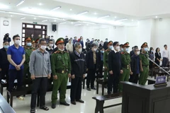 Các bị cáo tại phiên tòa. (Ảnh: Văn Điệp/TTXVN)