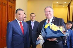 Bộ trưởng Bộ Công an Tô Lâm đón Ngoại trưởng Hoa Kỳ Mike Pompeo. (Ảnh: Doãn Tấn/TTXVN)
