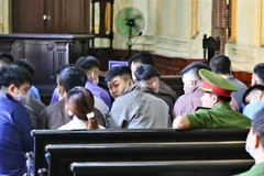 Các bị cáo tại phiên tòa. (Ảnh: Thành Chung/TTXVN)