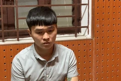 Đối tượng Trần Công Đức tại cơ quan điều tra. (Ảnh: TTXVN phát)