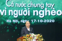 Thủ tướng Nguyễn Xuân Phúc phát biểu tại chương trình 'Cả nước chung tay vì người nghèo' năm 2020. (Ảnh: Doãn Tấn/TTXVN)