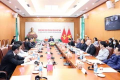 Quang cảnh cuộc đối thoại trực tuyến tại điểm cầu Hà Nội. (Ảnh: Phương Hoa/TTXVN)