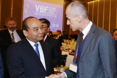 Thủ tướng Nguyễn Xuân Phúc và các đại biểu tại diễn đàn. (Ảnh: Thống Nhất/TTXVN)