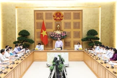 Thủ tướng Phạm Minh Chính chủ trì Hội nghị trực tuyến toàn quốc với các bộ, cơ quan Trung ương và địa phương về đẩy mạnh giải ngân kế hoạch vốn đầu tư công năm 2021, ngày 28/9 vừa qua. (Ảnh: Dương Giang/TTXVN)