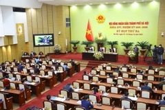 Quang ảnh phiên khai mạc Kỳ họp thứ ba, Hội đồng Nhân dân thành phố Hà Nội khóa XVI. (Ảnh: Văn Điệp/TTXVN)