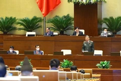 Bộ trưởng Bộ Công an Tô Lâm phát biểu giải trình, làm rõ một số vấn đề đại biểu Quốc hội nêu. (Ảnh: Văn Điệp/TTXVN)