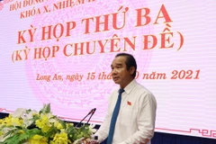 Bí thư Tỉnh ủy, Chủ tịch HĐND tỉnh Long An Nguyễn Văn Được phát biểu tại Kỳ họp. (Ảnh: Thanh Bình/TTXVN)