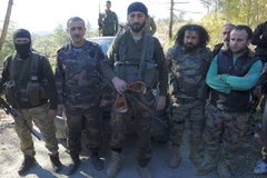 Alparslan Celik (giữa) bị nghi đã sát hại viên phi công Su-24 của Nga. (Nguồn: politicoscope.com)