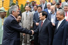 Chủ tịch nước Trương Tấn Sang tiếp Tổng thư ký Liên hiệp Công đoàn Thế giới George Mavrikos. (Ảnh: Nguyễn Khang/TTXVN)