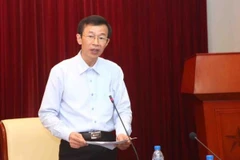 Giáo sư Nguyễn Văn Minh chia sẻ thông tin về việc tổ chức kỳ Olympic Sinh học quốc tế. (Ảnh: Quý Trung/TTXVN)