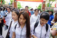 Nét mặt mệt mỏi, buồn bã và lo lắng của thí sinh khi làm thi môn Hóa không được tốt. (Ảnh: Việt Phương/Vietnam+)