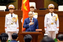 Chủ tịch nước Nguyễn Xuân Phúc tuyên thệ nhậm chức trước Quốc hội, đồng bào và cử tri cả nước. (Ảnh: Doãn Tấn/TTXVN)