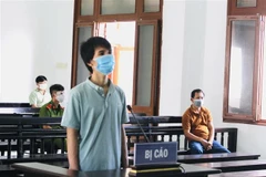 Ngô Công Trứ nghe tòa tuyên án. (Ảnh: TTXVN)