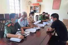 Đối tượng Nguyễn Văn Giang làm việc với cơ quan chức năng. (Ảnh: Thùy Dung/TTXVN)
